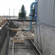 Concrete works for foundation with pipe penetration into building