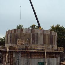 Digester formwork being craned into place