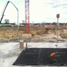 Tower crane and pump truck pouring slab